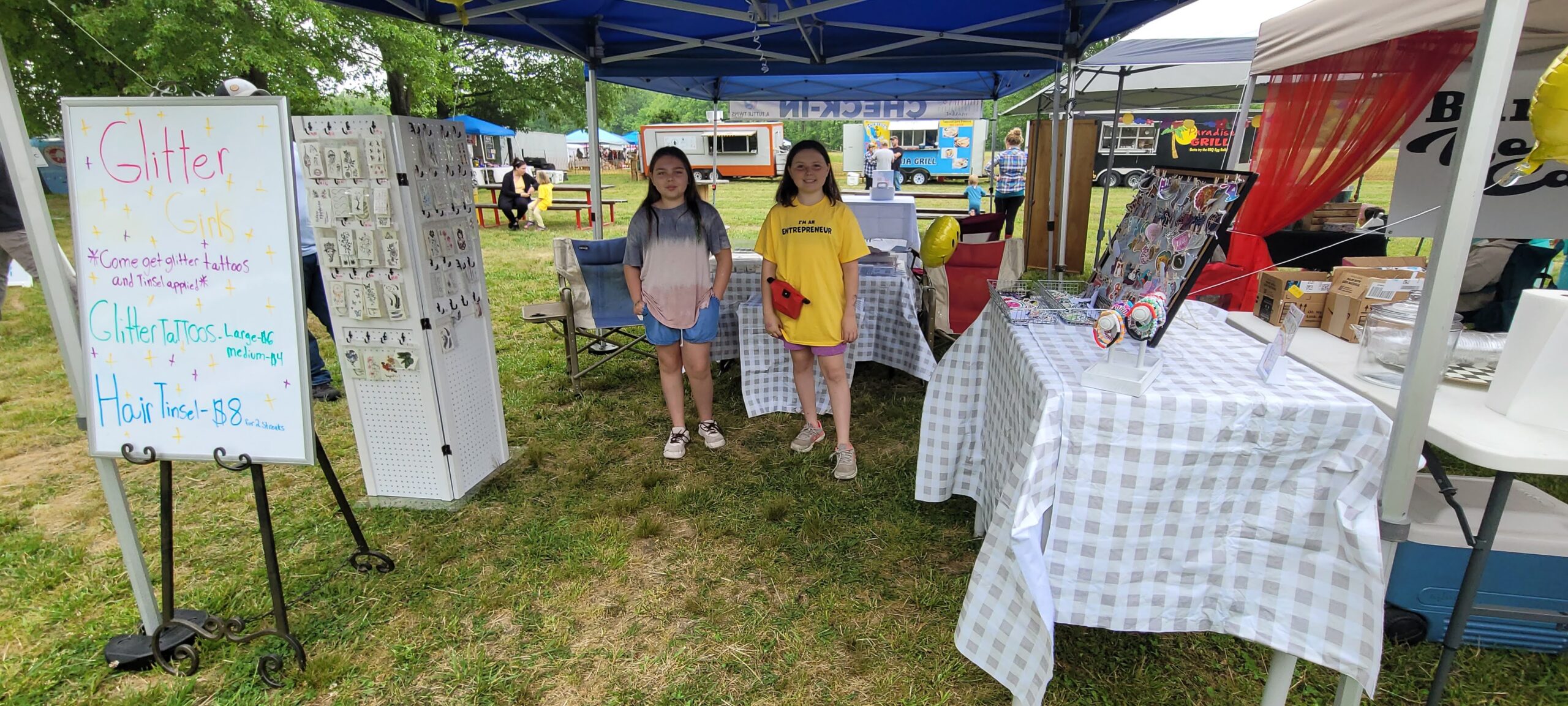 While at our Millington, TN market on May 6th, we got to meet the Glitter Girls! Sophia, 13 and Abby, 11, ran their booth with the 
help of their 4-year-old sister Gwen. This was their first market and they talked to, and hair tinseled, our Nashville manager, Amanda!