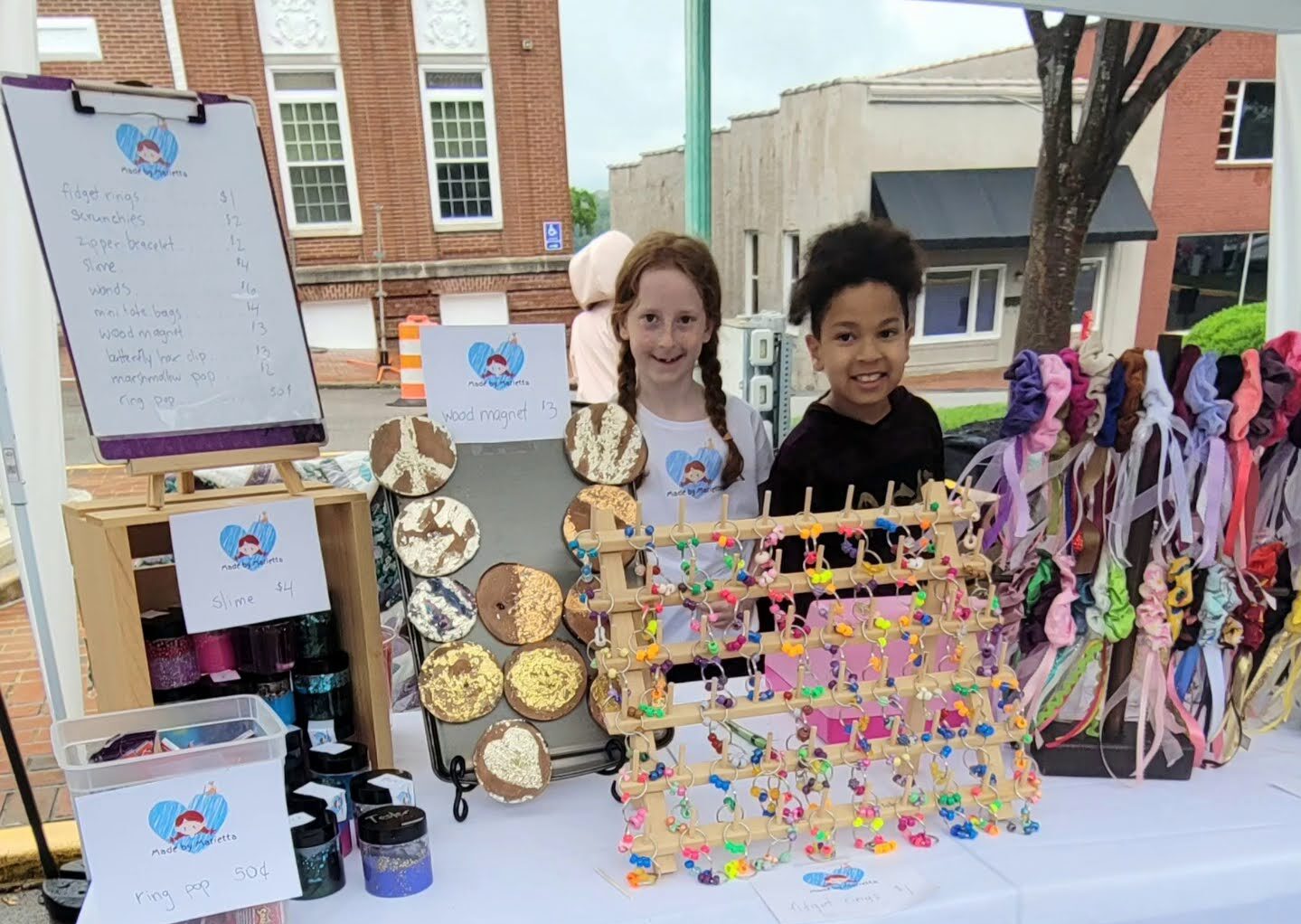 During our market in Clarksville, TN we met up with Marietta, 7, who had a great booth that attracted a lot of attention with her wheel of discounts and prizes.